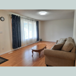 Bright living area and front entry